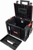 An open black rolling tool chest with an orange trim and red accents, shown with its removable tray in front of it. Náhled obrázku produktu