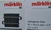 Close-up of two sections of Märklin HO scale model train track packaging. Produktbild-Vorschau
