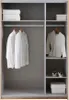 An open wardrobe with clothes and storage boxes. Produktbild-Vorschau