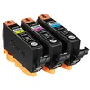 Three Canon ink cartridges are displayed in a row, each with an orange tab and a black body. The cartridges are labeled with their respective colors: yellow, magenta, and cyan. They are sitting in orange plastic holders. Náhled obrázku produktu