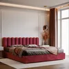 A modern bedroom scene with a red upholstered bed as the main focus. Anteprima dell’immagine prodotto