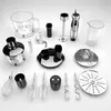 A collection of kitchen appliance attachments and accessories laid out on a white and light gray background. Produktbild-Vorschau