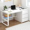 A white computer desk with a laptop, books, and decorative items. Produktbild-Vorschau