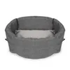 A gray dog bed with a light gray cushion inside, presented against a white background. Produktbild-Vorschau