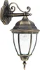 A classic outdoor wall lantern with a gold/bronze finish and clear glass panels, shown against a white background. Voir les images du produit