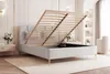 A cream-colored bed with its storage compartment open, revealing the slatted base and storage space. Náhled obrázku produktu