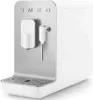 A white SMEG coffee machine with a silver front panel. Produktbild-Vorschau