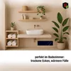 A modern bathroom with a sink, shelves, and a plant, featuring a heating panel on the wall. Náhled obrázku produktu