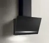 A black range hood mounted on a textured wall. Produktbild-Vorschau