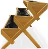A tiered wooden planter box. Produktbild-Vorschau