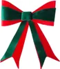 A decorative bow made of red and green velvet ribbon, isolated on a white background. Produktbild-Vorschau