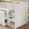 A close-up view of a white bunk bed with storage compartments. Produktbild-Vorschau