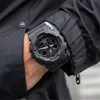 A person wearing a black jacket and a black G-Shock watch. Podgląd zdjęcia produktu