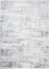 A close-up view of a rug with a distressed pattern. Náhled obrázku produktu