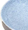 A close-up view of the speckled blue interior of a ceramic sink. Produktbild-Vorschau