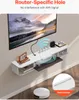 A white wall-mounted TV cabinet with a TV mounted above it, and various electronic devices and decorative items on the shelves. Voir les images du produit