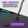 Close-up of a desk surface with cable management features and LED lighting. Voir les images du produit