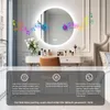 A vanity area with a lit mirror, makeup, and a chair. Anteprima dell’immagine prodotto