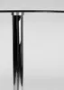 A close-up shot of the base of a glass table, showing the chrome-plated metal leg and the connection to the glass tabletop. Produktbild-Vorschau