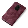 A burgundy flip case for a smartphone is shown against a white background. Produktbild-Vorschau