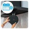 A person is holding a charcoal filter for a range hood, with a graphic overlay indicating filter replacement. Produktbild-Vorschau