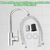 A chrome faucet and plumbing accessories are laid out on a tiled background. Anteprima dell’immagine prodotto