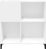 A white, four-compartment shelving unit with black legs. Náhled obrázku produktu