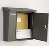 A dark gray mailbox with its door open, revealing two envelopes inside. The mailbox has the word "ZEITUNGEN" printed on its side. Produktbild-Vorschau