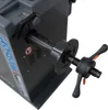Close-up of a wheel balancing machine's spindle and locking mechanism. Produktbild-Vorschau