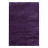 A fluffy, shaggy rug with a high pile, presented in a rectangular shape and a vibrant purple color. Anteprima dell’immagine prodotto