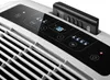 Close-up of the control panel and remote of a portable air conditioner. Voir les images du produit
