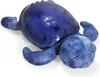 A blue plush turtle toy with its eyes closed, lying on its back. Voir les images du produit