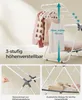 A white folding drying rack with clothes hanging on it, shown with close-up details of its construction and a shelf. Produktbild-Vorschau