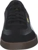 A front view of a black Puma sneaker with a brown sole. Voir les images du produit