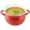 A red pot filled with soup and garnished with parsley, isolated on a white background. Podgląd zdjęcia produktu