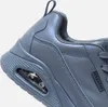 Close-up of the heel and side of a blue Skechers sneaker. Náhľad obrázku produktu