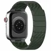 A smartwatch with a green carbon fiber band, viewed from the back. Náhled obrázku produktu