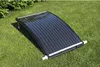 A solar collector for a pool sits on a grassy lawn. Produktbild-Vorschau