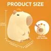 A product size chart for a capybara-shaped night light, showing dimensions and material information. Náhled obrázku produktu