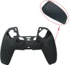 A black silicone controller cover for a PlayStation 5. Podgląd zdjęcia produktu