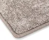 A close-up view of the corner of a beige velour rug. Náhled obrázku produktu