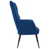 A side view of a blue velvet armchair. Náhled obrázku produktu