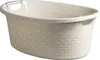 A light-colored oval laundry basket with handles, shown against a white background. Podgląd zdjęcia produktu