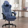 A blue gaming chair is shown in a home office setting next to a desk with a laptop. Produktbild-Vorschau