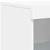 A close-up of a white furniture piece, likely a cabinet or sideboard, showing a corner and a shelf opening. Podgląd zdjęcia produktu