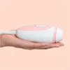 A hand holding a pink and white hair removal device against a pink background. Anteprima dell’immagine prodotto