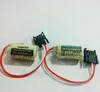 Two Sanyo lithium batteries with attached connectors are laid out on a white surface. Produktbild-Vorschau