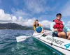 Two people are in an inflatable boat on the water. Náhľad obrázku produktu