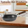A black pot with a wooden handle sits on a wooden countertop in a kitchen setting. Produktbild-Vorschau