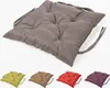 A main product image of a gray seat cushion with smaller images of the same cushion in different colors below. Produktbild-Vorschau